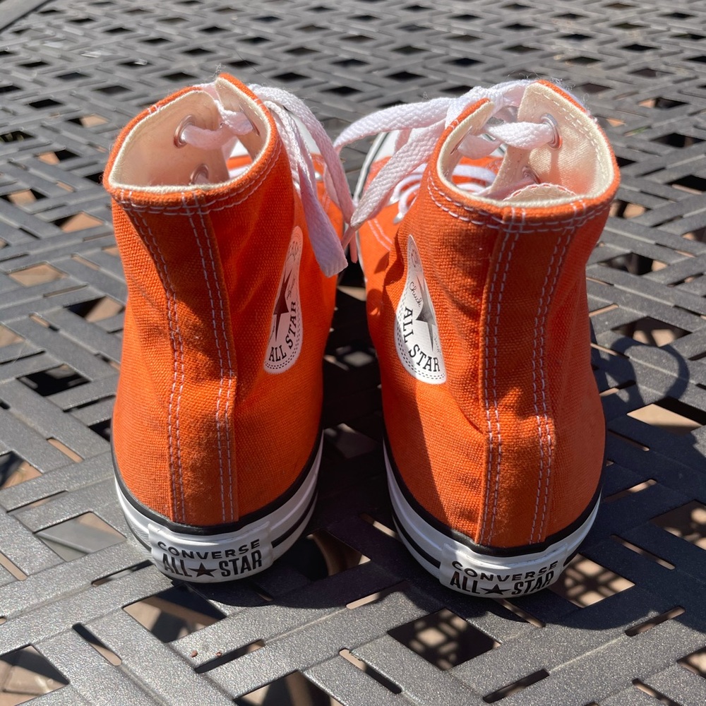 Orange high top converse